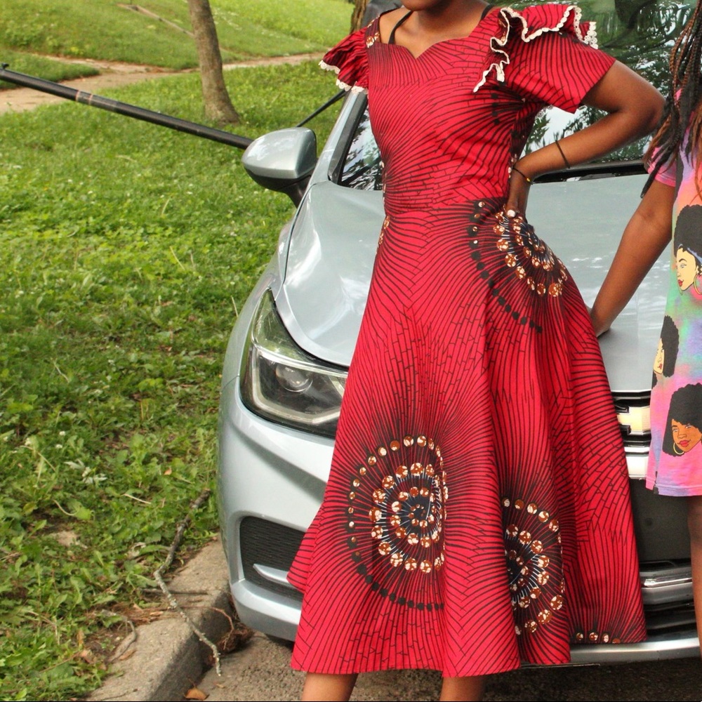 This amazing ,colorful beautiful dress,with rich Materials am size S